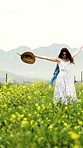 Freedom, spinning and smile with woman in field in nature for adventure, spring vacation and celebration. Happiness, flowers and holiday with person in countryside for peace, energy and journey