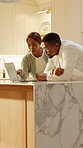 Laptop, conversation and black couple in kitchen at house for planning monthly budget or savings. Running, children and man with woman on computer for internet banking with asset management in home.