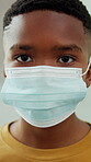 Face, mask and boy for health, protection or safety from disease with medical compliance. Rule, regulation and black child with facial cover for healthcare, caution for virus and hygiene protocol