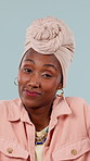 Confused, face and shrug with black woman in studio for why, hands or dont know gesture on blue background. Doubt, portrait and African person with questions, decision or palm scale emoji choice