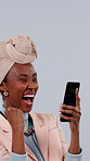 Woman, phone and celebration in studio for win, laugh or gambling success on white background. Mobile, fist pump or excited black person with goal, financial bonus or typing for prize with online bet