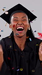 Happy, student and black woman with confetti in studio for graduation ceremony on a gray background. Excited, female person or graduate with smile in celebration for academic achievement or milestone