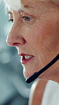 Mic, woman and call center consultant in office with crm, help desk or communication for enquiry. Headset, talking and mature technical support agent with contact us, customer service or consultation