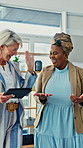 Happy, women and high five with tablet in office for winning, good news or achievement together. Creative, female people or employees with smile or technology for promotion, bonus or business success