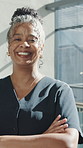 Face, business and black woman in office with arms crossed, career pride and about us for copywriting. Portrait, mature person and smile in workplace with ambition, news reporter and public relations