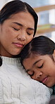 Mother, child and hug with laptop for remote work, kindness and comfort for stress relief in house. Woman, daughter and embrace in home with computer, freelance job difficulty and kid support parent.