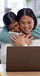 Mother, kid and hug with laptop for remote work, kindness and smile for bonding together in house. Happy, woman and daughter embrace in home with computer, freelance job and child support parent.
