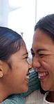 Nose, touch and child with mom in home for bonding, connection and happy relationship on weekend. House, family and girl with mother, embrace and laugh for affection, support and playful for love