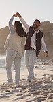 Travel, dance and smile with couple at beach for romantic getaway, vacation and connection. Anniversary holiday, holding hands and love with man and woman outdoor for date, spin and trust together