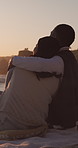 Love, couple and hug on beach with view for anniversary getaway, bonding and sightseeing at sunset. Back, people or embrace with pointing for romantic holiday, healthy relationship or exploring ocean