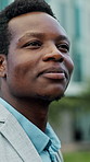 Business, smile and thinking with black man in city for job opportunity or morning commute. About us, inspiration and travel with happy employee person outdoor in urban town for career ambition
