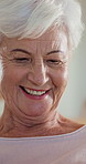 Smile, tablet and senior woman in home with funny meme, blog or online newsletter in living room. Happy, digital technology and elderly person in retirement watching comedy video on app in house.