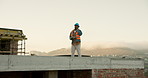 Phone call, tablet and construction worker on site for feedback on maintenance, repairs or building. Black man, technology and civil engineer on rooftop for mobile discussion for on renovation update