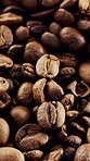 Grinding, roasted and coffee beans with blend for harvest, production and textures for caffeine. Rustic, granules and arabica grain for manufacturing, fermentation process and rich flavor for brewing