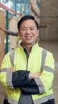 Crossed arms, man and face of distribution worker in warehouse with confidence for logistics career. Happy, about us and portrait of supply chain manager with pride for cargo, delivery or shipping.
