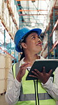 Woman, logistics and checking inventory with tablet in warehouse for shipping or quality assurance. Female person, distributor or supplier with smile or technology for stock or storage in depot