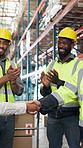 People, logistics and partnership with handshake in warehouse for shipping or distribution deal. Employees, colleagues or shaking hands with team applause in depot for supply chain success or b2b