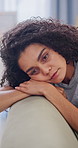 Thinking, tired and woman with depression on sofa in home living room for heartbreak or loss. Fatigue, memories and psychology with unhappy person in apartment for regret, mistake or perspective