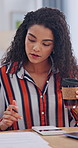 Calculator, coffee and documents with business woman at desk in office for budget or finance. Accounting, drink and writing with financial employee in workplace for investment or savings calculation