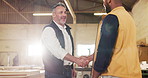 Carpenter, people and handshake in factory with partnership, discussion or manufacturing agreement. Flare, happy manager or men shaking hands in workshop with deal, success or woodwork collaboration.
