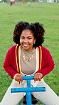 Face, fun and laughing with black woman on seesaw in park for holiday, vacation or weekend. Happy, portrait and pov with person at outdoor playground in nature for energy, excitement or wellness
