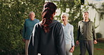Fitness, instructor and people with outdoor class for senior wellness, health and shoulder shrug. Retirement group, trainer or workout with neck exercise for pilates, practice or training in backyard