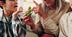 Kids, grandmother and learning with frog in hands, bonding together and development at home. Grandparent, boy and miniature toy in apartment for animal facts, education and talking with family