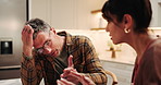 Stress, couple and argument in kitchen for marriage problem, divorce and toxic relationship. Mature man, woman and quarrel at home, fight and frustrated partner with conflict for cheating affair