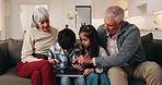 Grandparents, kids and sofa with tablet for interaction, online game or engagement in home. Grandpa, grandma and children playing with technology together for network, connection or app in house