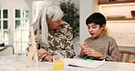 Grandmother, child and counting in home with abacus, math lesson and advice for education. Senior woman, help and kid at house with notebook, learning support and calculating beads for study session