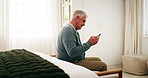 Senior, man and scroll in bedroom with phone, research and browsing website for retirement planning. Elderly person, relax and smile in house with tech, reading and mobile app for life insurance.