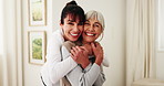 Hug, face and elderly woman in home with caregiver, comfort and wellness in health community. Happy, portrait and senior person with support, retirement and help with compassion or medical service