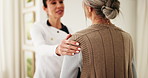 Healthcare, old woman and caregiver support in home with health checkup, follow up care or service. Hand on shoulder, senior patient or carer in homecare for medical advice, encourage healing or help