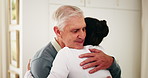 Senior, man or hug with caregiver in nursing home for healthcare assistance, support or help. Elderly, male person or embrace with therapist, gratitude or appreciation for health or wellness in house