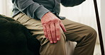 Senior, hands and knee pain discomfort on bed for arthritis, gout stiffness and walking stick. Retirement, massage or old person with disability in home from osteoarthritis, torn ligament or sore leg