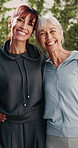 Women, face and happy friends with hug for fitness, health or outdoor wellness together in park. Portrait, active or mature female people with smile for bonding, community or friendship in nature