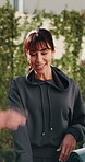 Fitness, woman and people with hands stack for motivation, exercise goals and support for wellness. Happy, team and trainer with applause, celebrate and excited for training, yoga and health outdoor