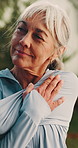 Senior, woman and thinking with stretching outdoor, exercise and wellness with warm up, self care and vision. Health, mindset or mindfulness with old person in nature, ready for fitness or training
