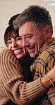 Hug, talking and couple on tablet for planning, online shopping and decision for interior decor. Marriage, excited and mature man and woman on tech with furniture choice, website and bonding in home