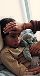 Mother, help and sick child in bed with comfort, teddy bear and monitor temperature for fever symptoms. Woman, tired son and console in home with empathy, stuffed animal and parent care for healing.