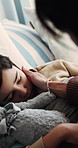 Mother, support and sick child in bedroom with comfort, conversation and monitor for fever symptoms. Woman, tired son talk and console in home with empathy, care and parent help for virus recovery.