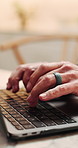 Laptop, hands and man in home with remote work for software development with analytics. Typing, keyboard and web designer with UX project for startup business with freelance career in apartment.