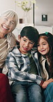 Face, grandmother and kids with love in home for bonding, connection and sibling visit at family. Grandparents, children and happy to relax in house for holiday break, relationship development or hug