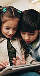 Children, relax and typing at house with tablet, browsing and download ebook for education. Family, kids and streaming in lounge with digital, watching video and educational games for online learning
