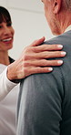 Hands, caregiver and old man in home for comfort, support and medical services for diagnosis. Smile, nurse or compassion at house with senior person, assisted living and consultation for elderly care