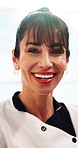 Face, woman and caregiver laugh in home for homecare, support worker and care assistant with pride. Portrait, funny and mature carer at house for health, wellness service or volunteer with confidence