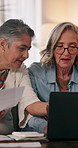 Financial planning, paperwork and lesbian couple with laptop in lounge, talking and checking savings. Lgbtq, relationship and mature women with tech for budget review, happy and documents in house