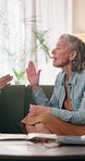 Argument, blame and lesbian couple on sofa in home living room for disagreement or frustration. Conflict, fighting and lgbt women in apartment for discussion of interracial relationship or stress
