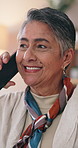 Smile phone call and senior woman in home for communication, chat and connection. Happy person, retirement and listening to gossip story with talking, mobile conversation and contact in house