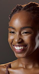 Beauty, funny and wellness with black woman in studio for hydration results or satisfaction. Aesthetic, glow and shine with person laughing on dark background for collagen, skincare or vitamin c
